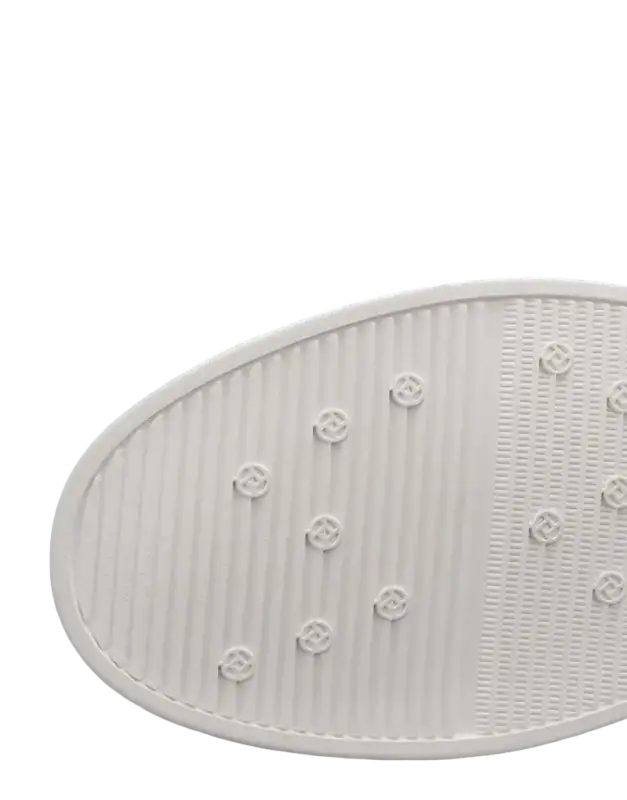 Shoe sole with textured grip.