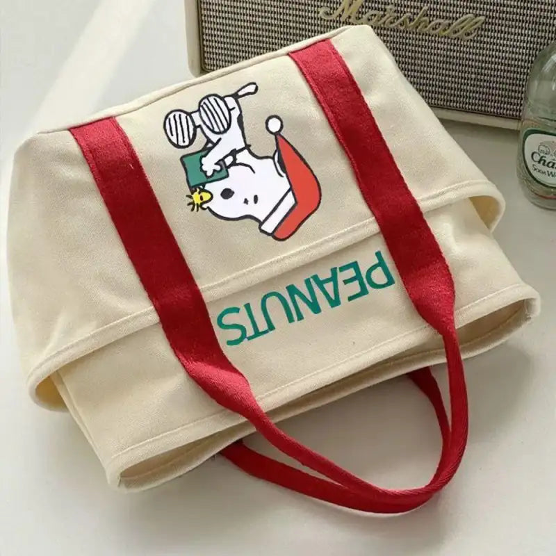 Canvas tote bag with Snoopy design.