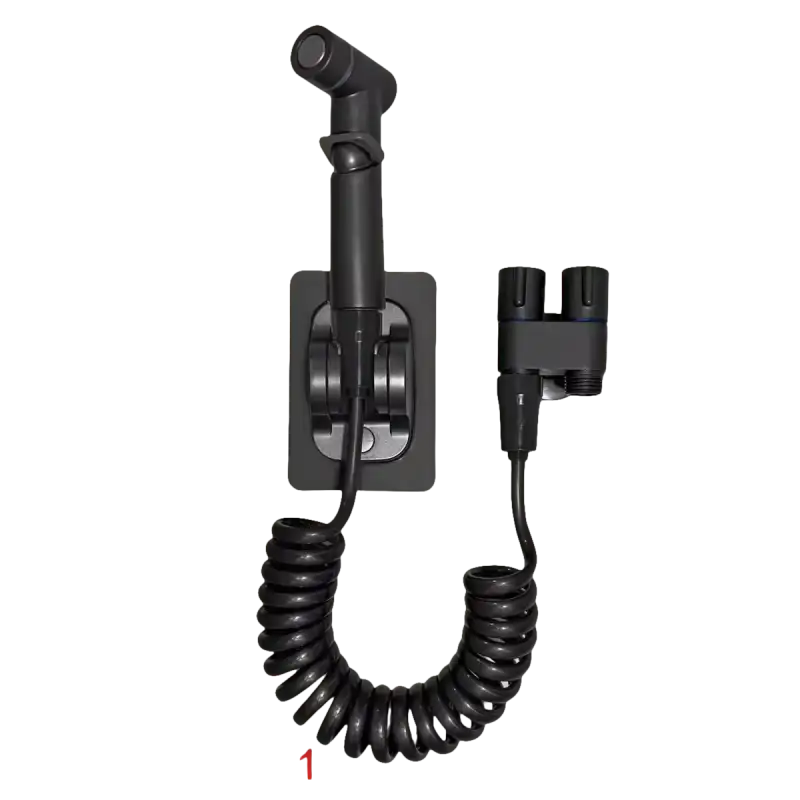 Black bidet sprayer with coiled hose.