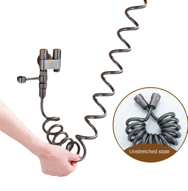 Coiled gray bidet hose with faucet.