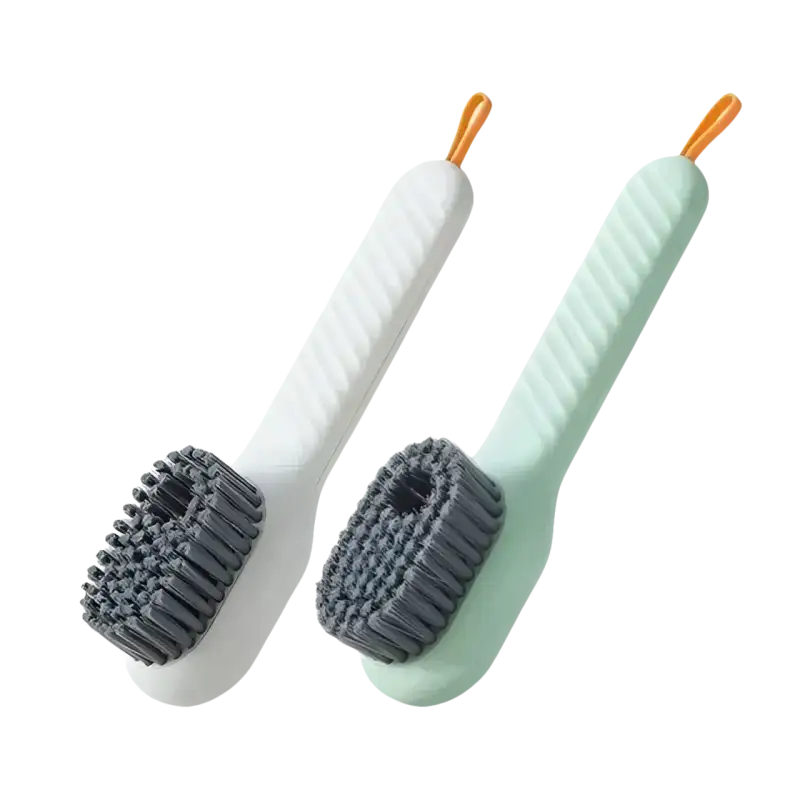 Two shoe cleaning brushes.