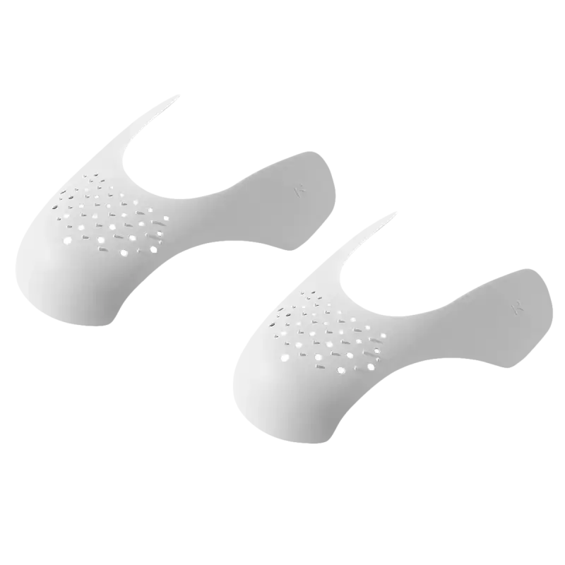 White perforated shoe inserts.