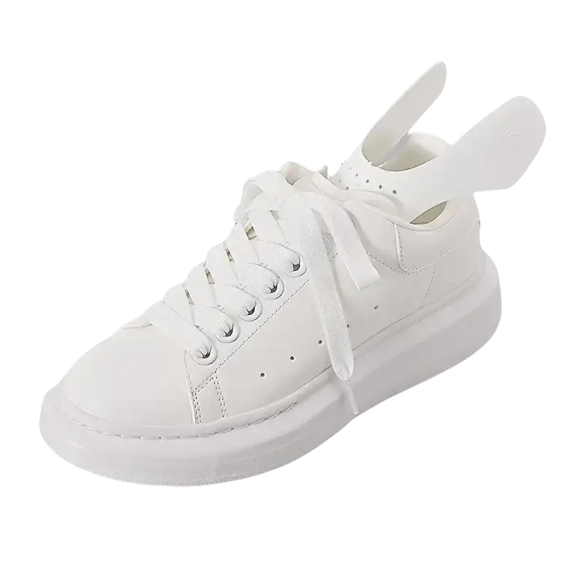 White leather sneaker with bunny ears.