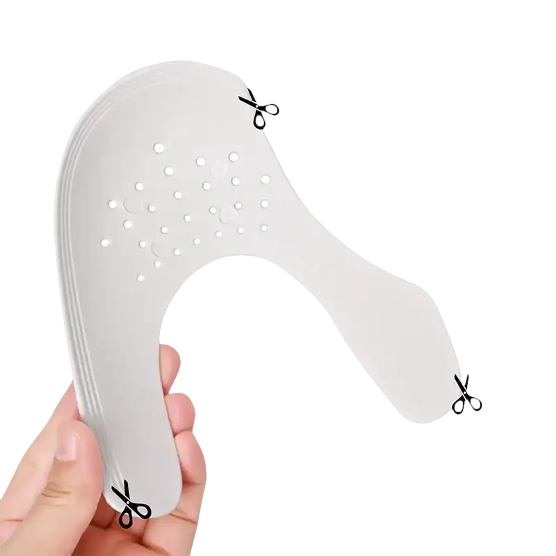Shoe shield inserts with cut lines.