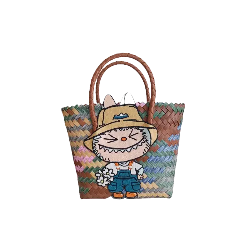 Woven tote bag with cartoon rabbit patch.