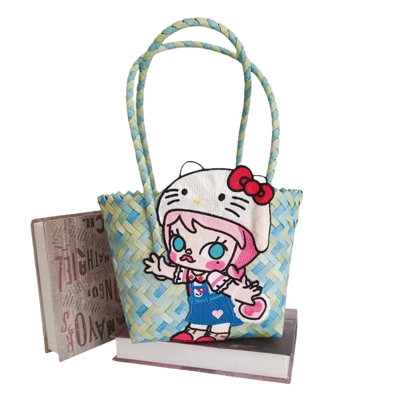 Woven blue and yellow tote bag with cartoon character.