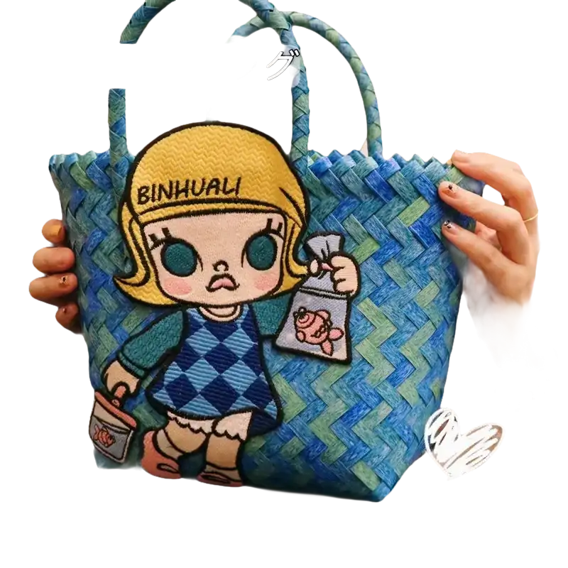 Blue woven tote bag with cartoon patch.