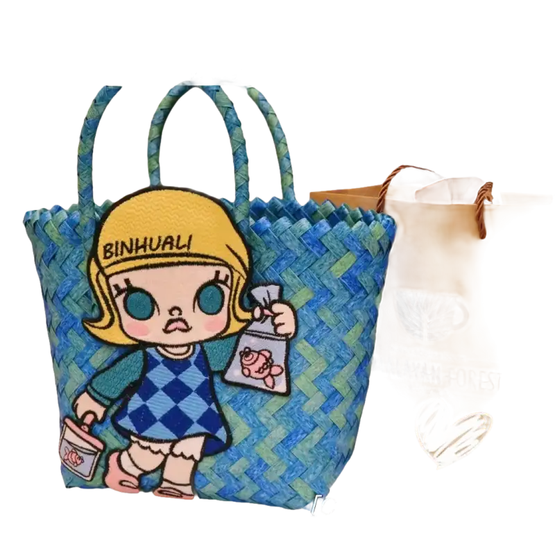 Blue woven tote bag with cartoon patch.