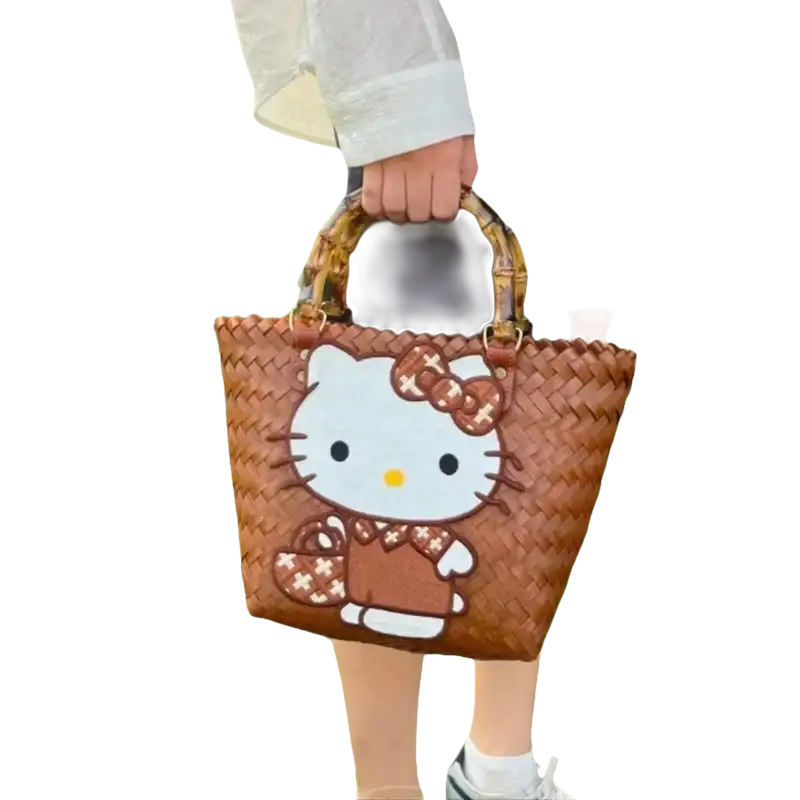 Brown woven Hello Kitty handbag.