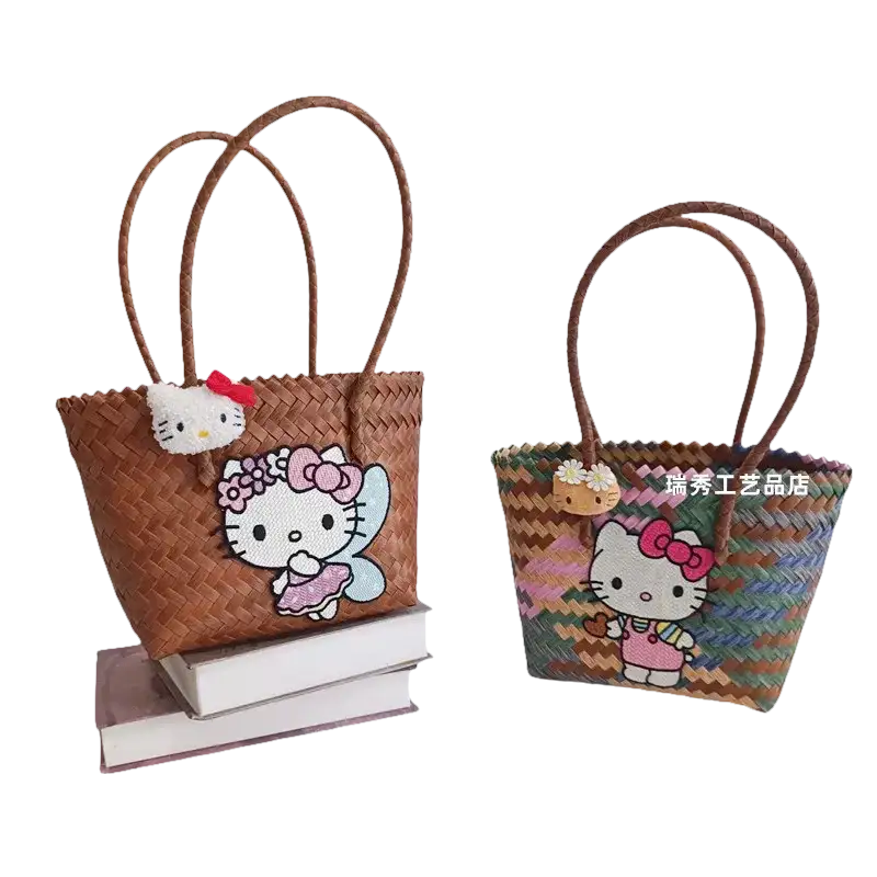 Woven straw tote bags with Hello Kitty embellishments.