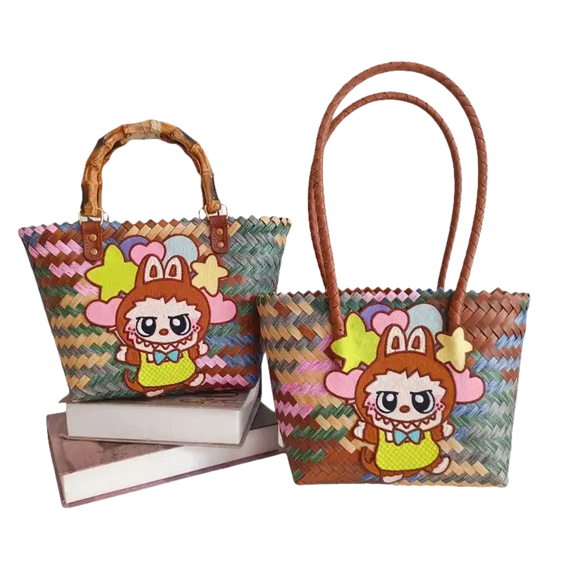 Two woven tote bags with cartoon character embellishments.