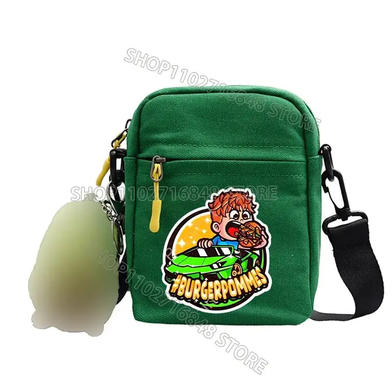 Green shoulder bag with cartoon sticker.