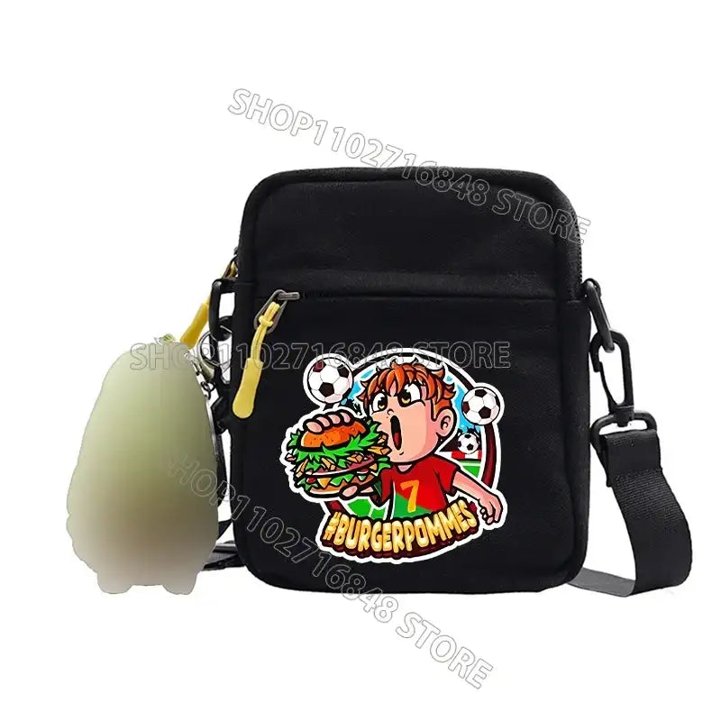 Black crossbody bag with cartoon sticker.