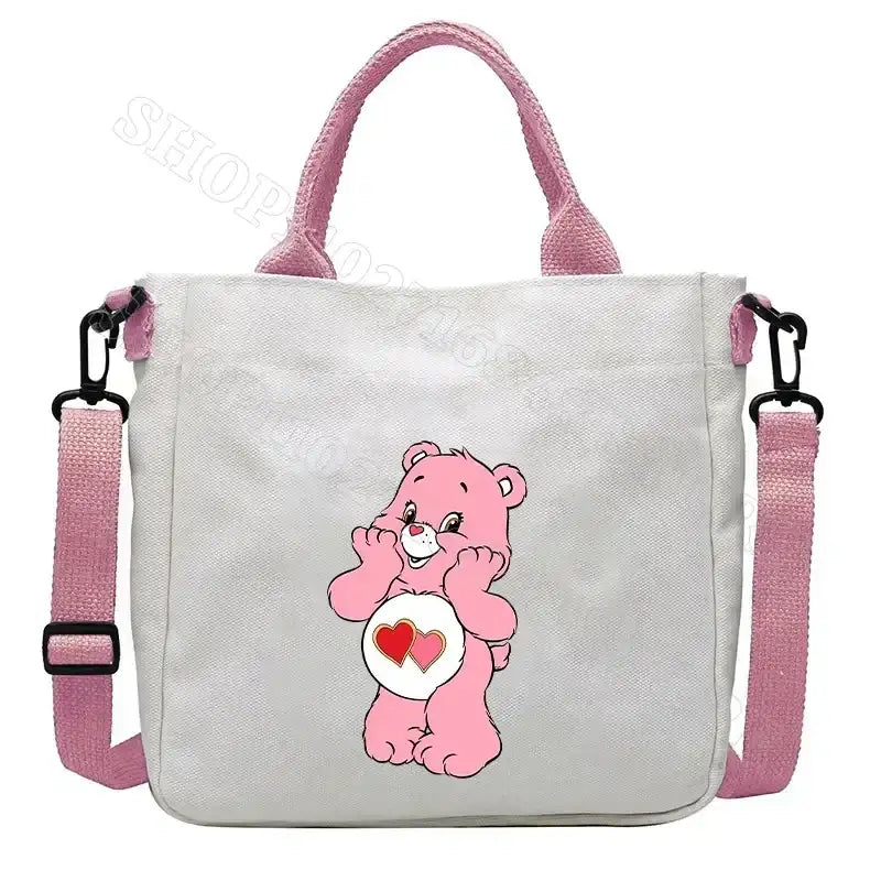 White tote bag with pink accents and a Care Bear design.