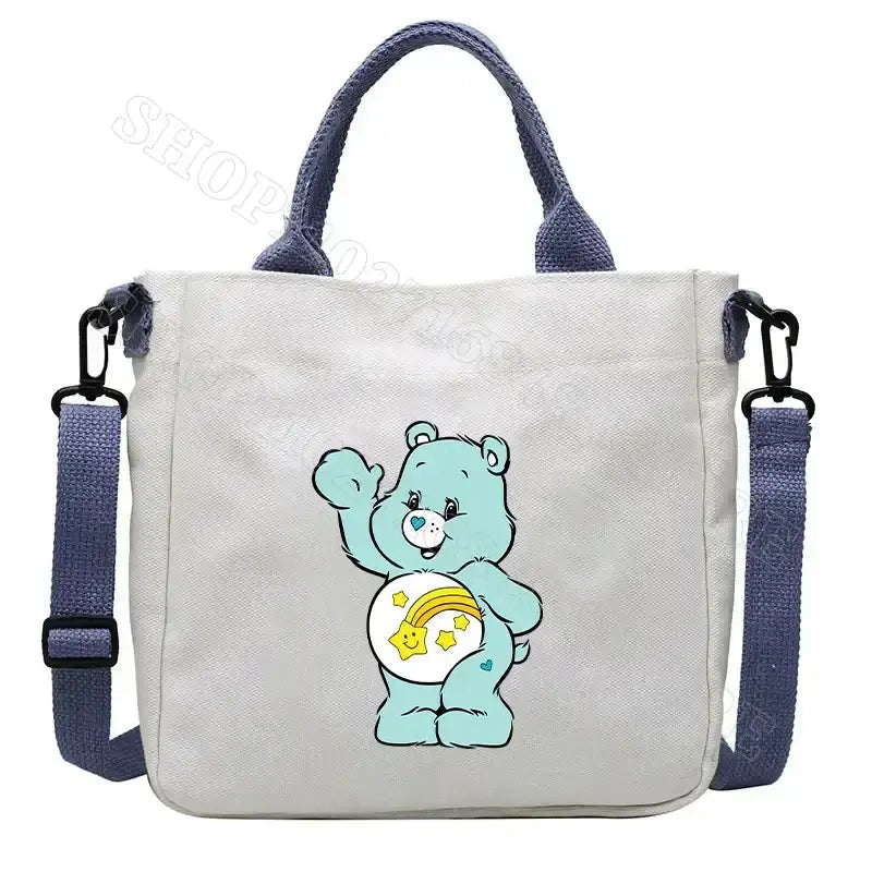 White tote bag with blue accents and a cartoon bear.