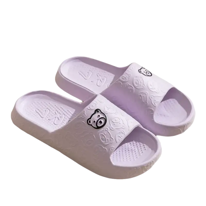 Lavender bear-themed slide sandals.