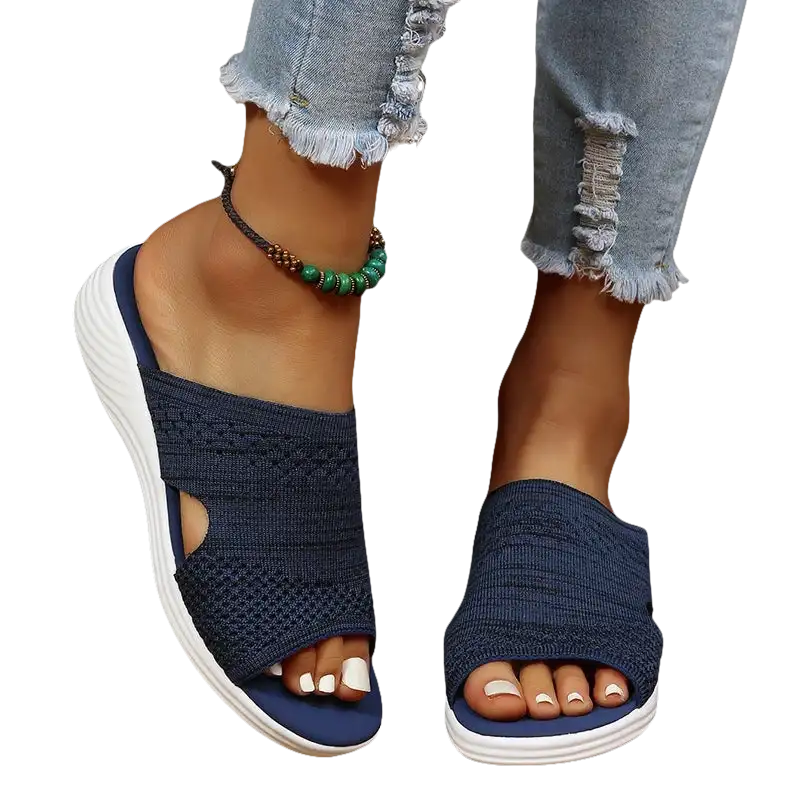 Blue knit slide sandals.