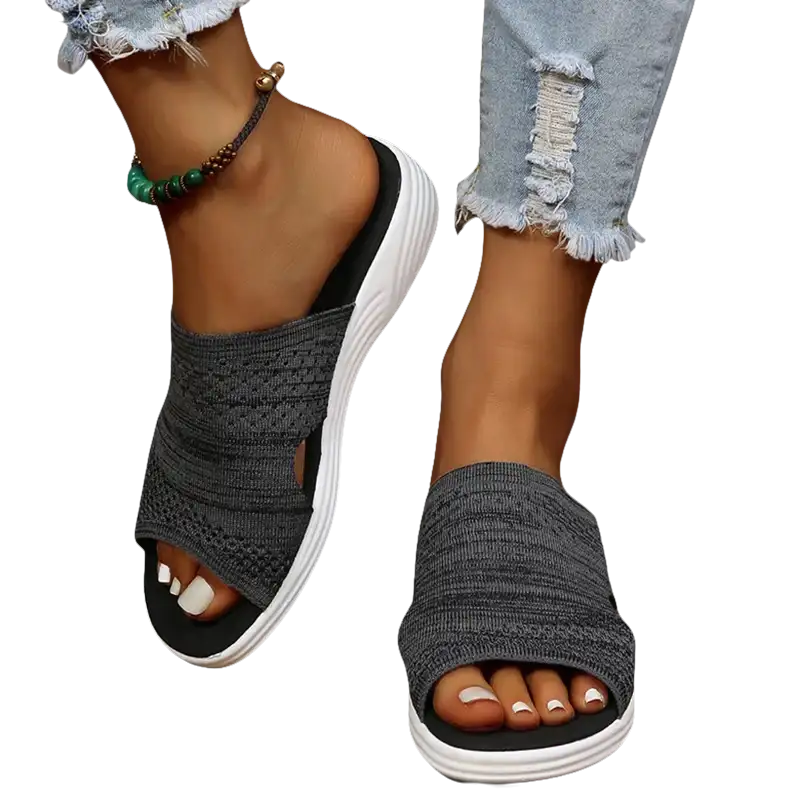 Gray knit slide sandals.