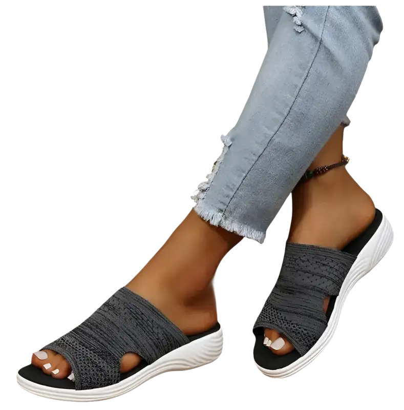 Gray knit slide sandals.