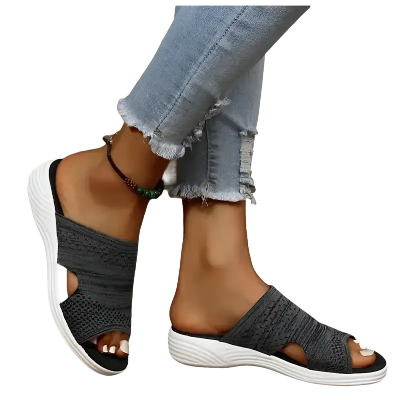 Gray knit slide sandals.