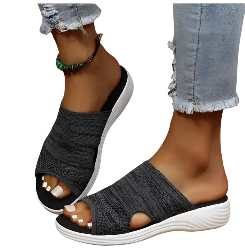 Gray knit slide sandals.