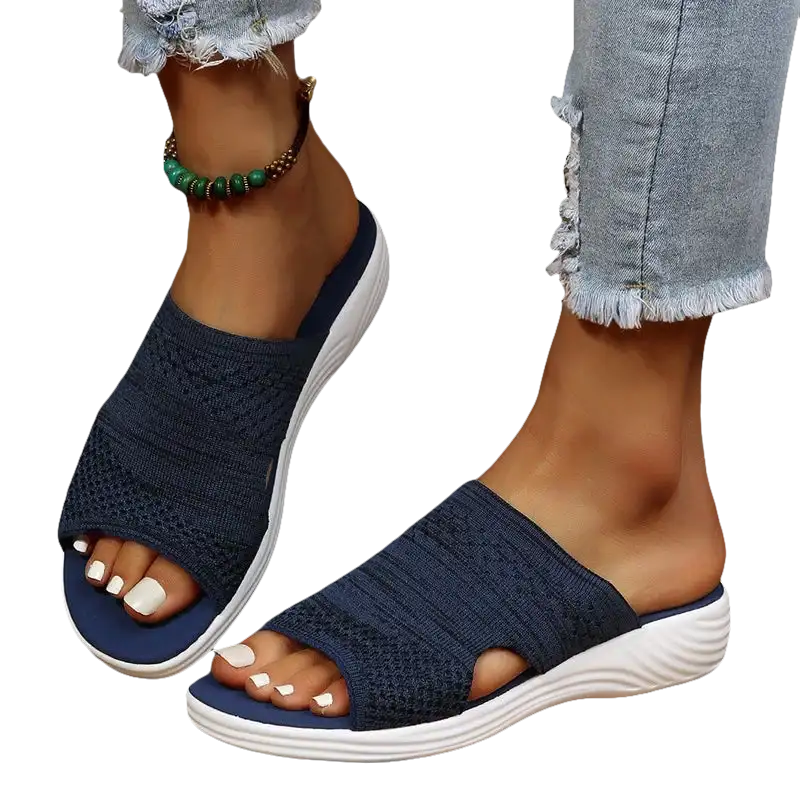 Navy knit slide sandals.