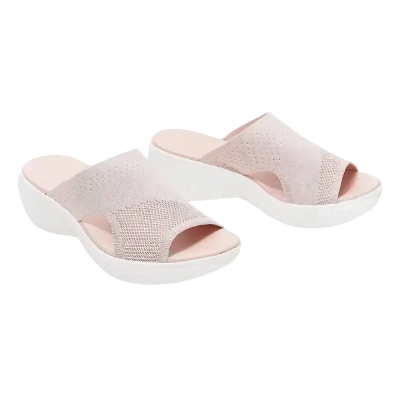 Pair of pink knit slide sandals.