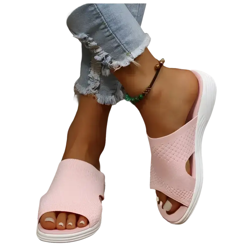 Pink knit slide sandals.