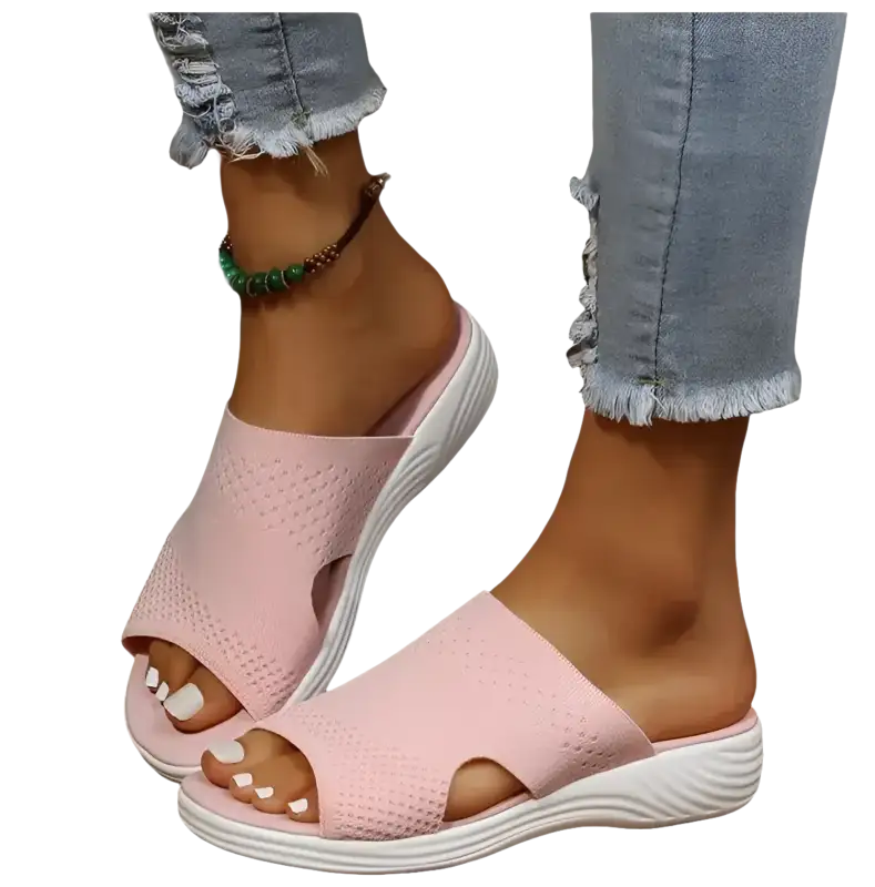 Pink knit slide sandals.