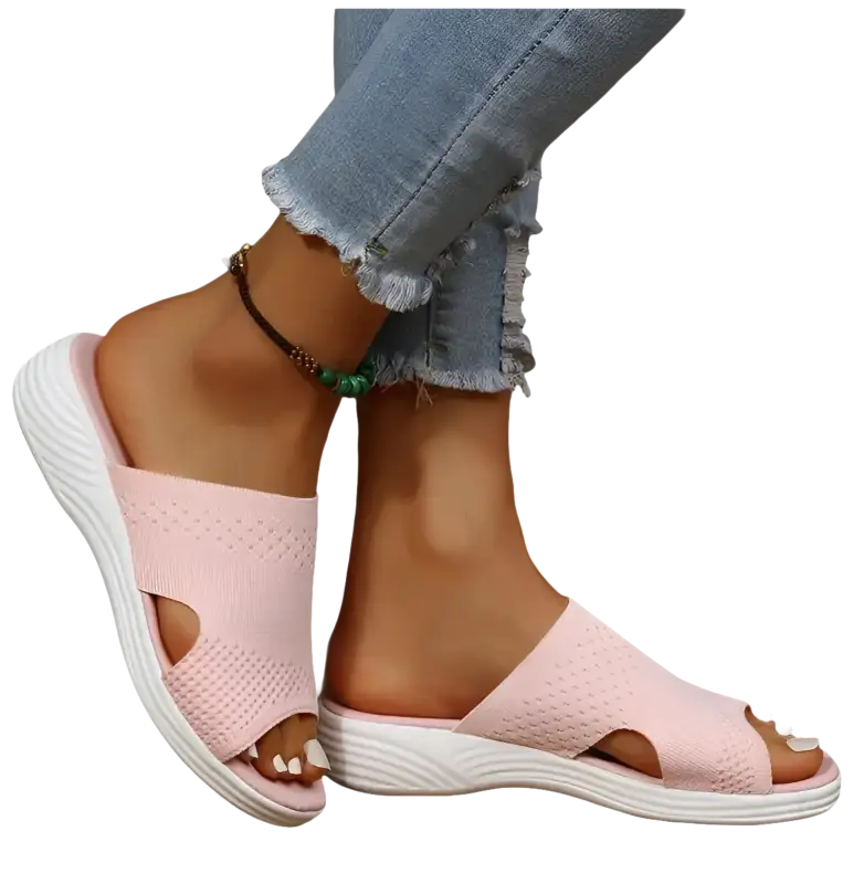 Pink knit slide sandals.