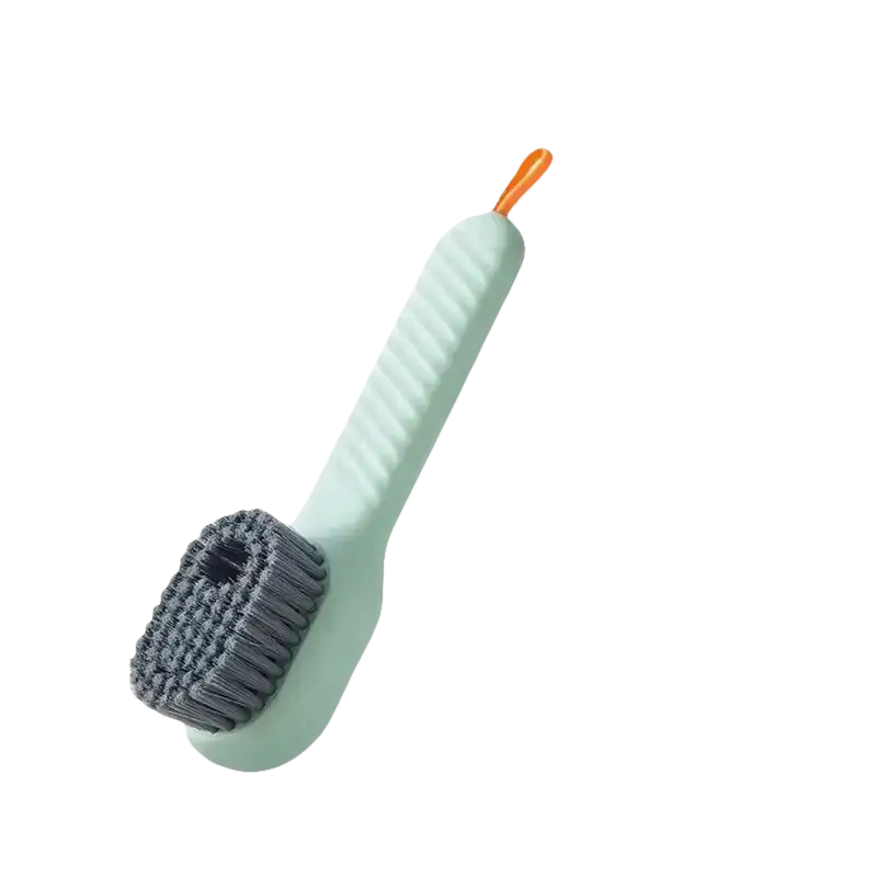 Green cleaning brush with handle.