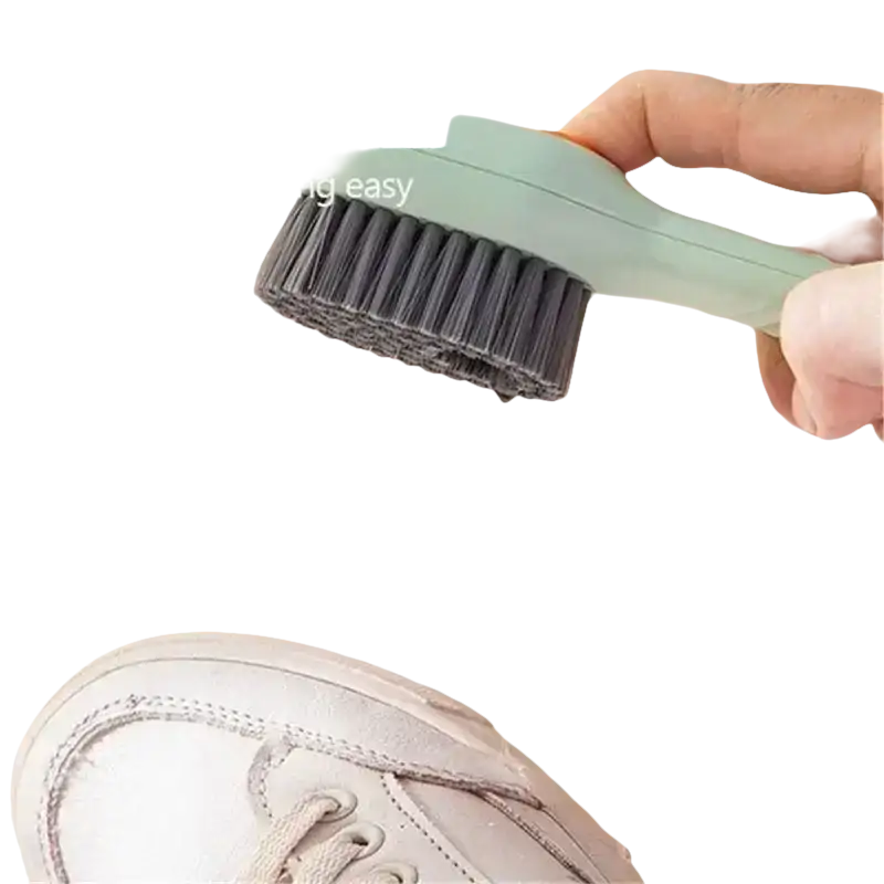 Cleaning brush dispensing liquid.