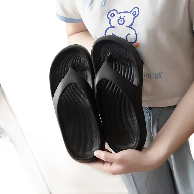 Black rubber flip-flops.