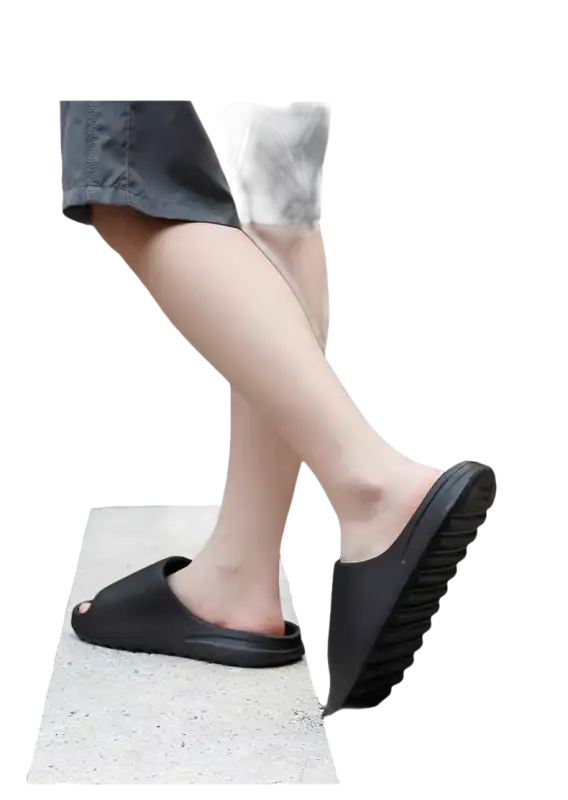 Black slip-on sandals.