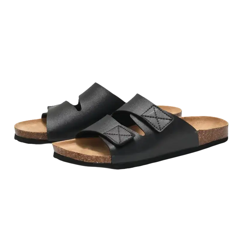 Black leather sandals with cork soles.