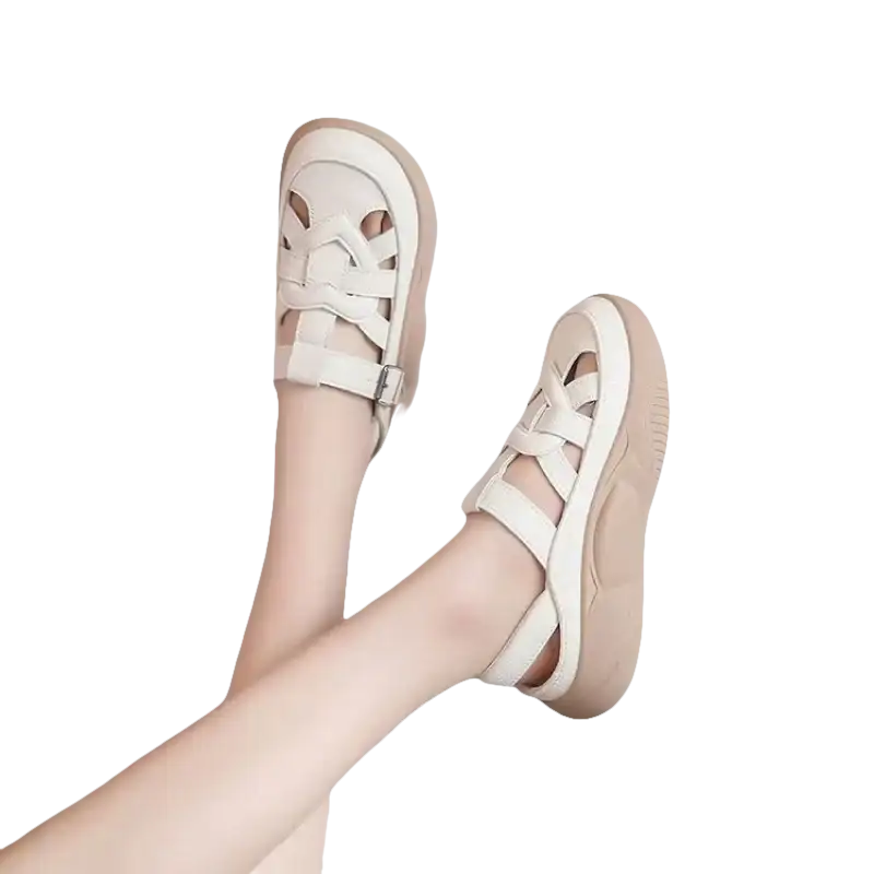 Beige leather platform sandals.