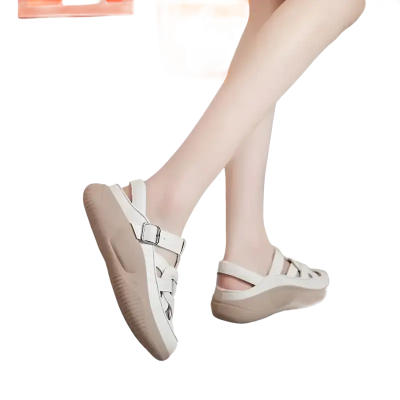 Women’s white leather sandals.