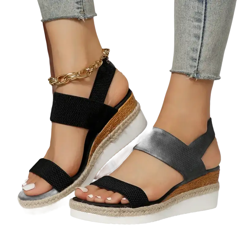 Black elastic wedge sandals.