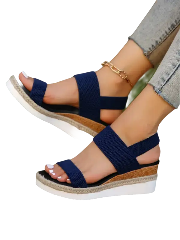 Navy blue elastic wedge sandals.