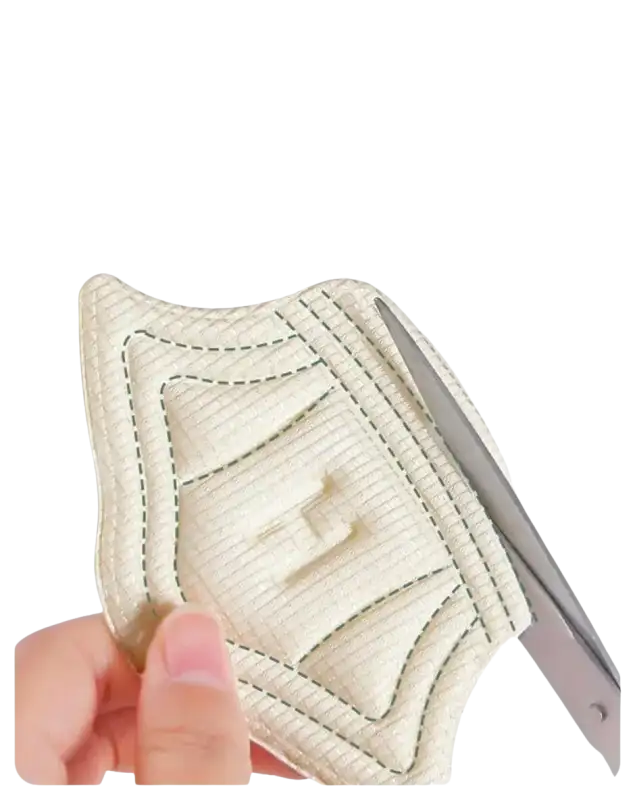 Cuttable shoe heel pad.