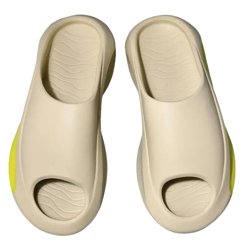 Beige open-toe platform slides.