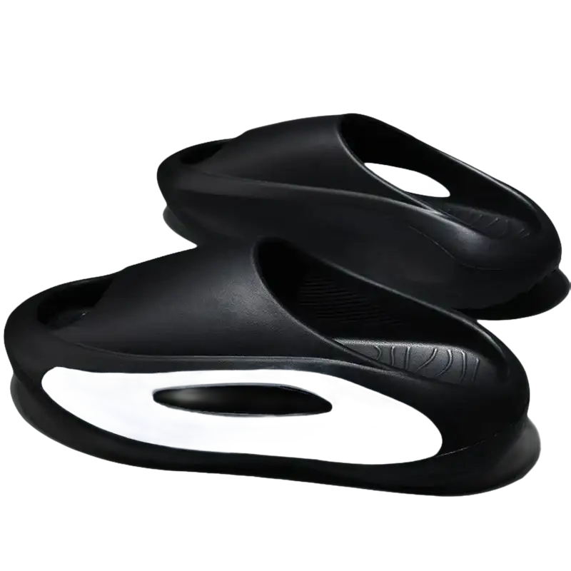 Black and white cushioned slides.