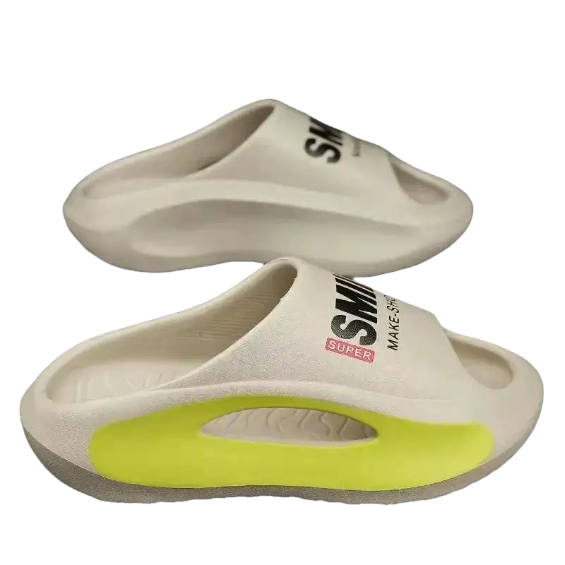 Cream-colored slide sandals with neon yellow accents.
