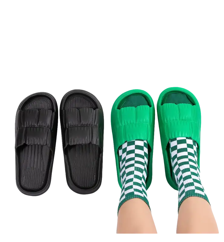 Black and green textured slide sandals.
