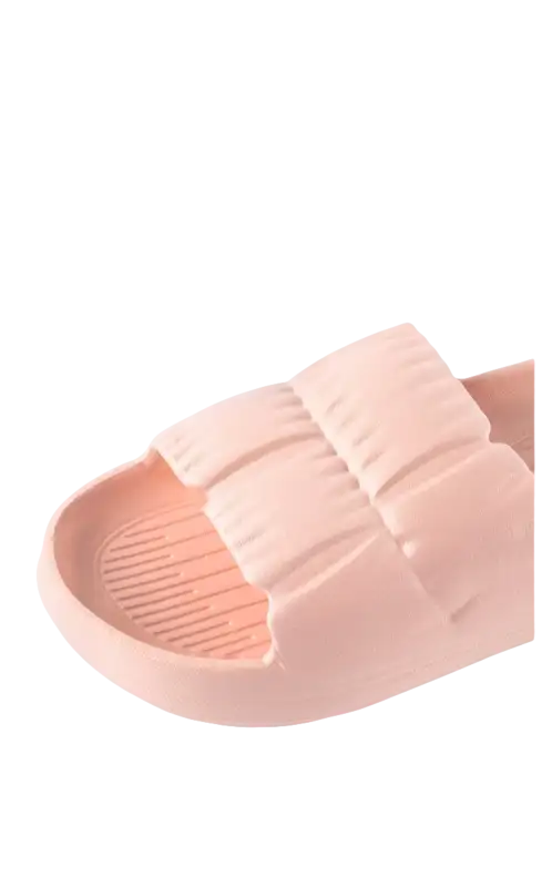 Pink cushioned slide sandal.