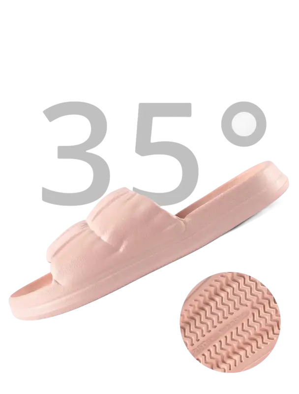 Pink slide sandal with grooved sole.