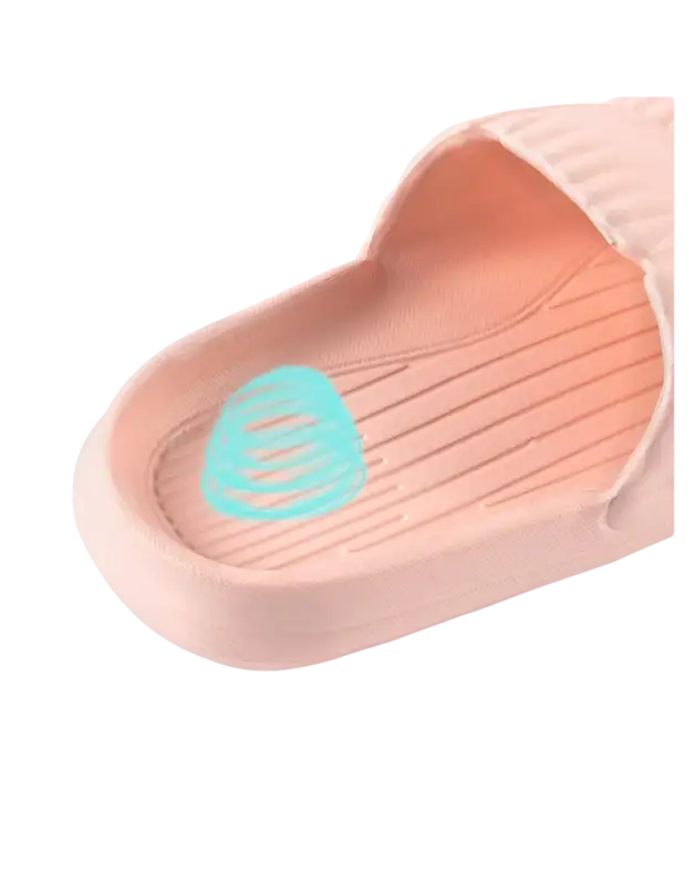 Pink EVA slipper with textured insole.