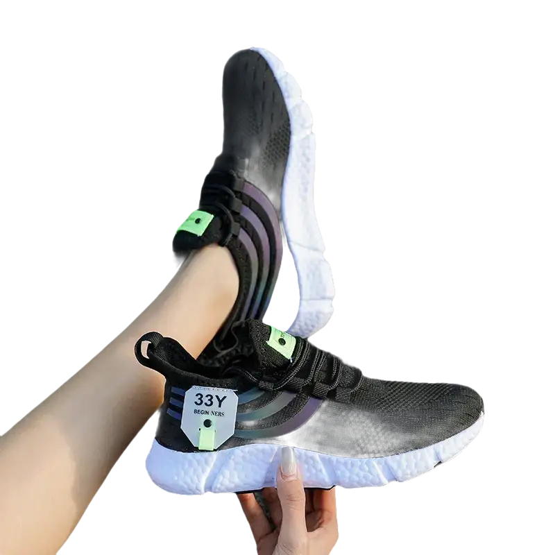 Black athletic shoes with white soles.
