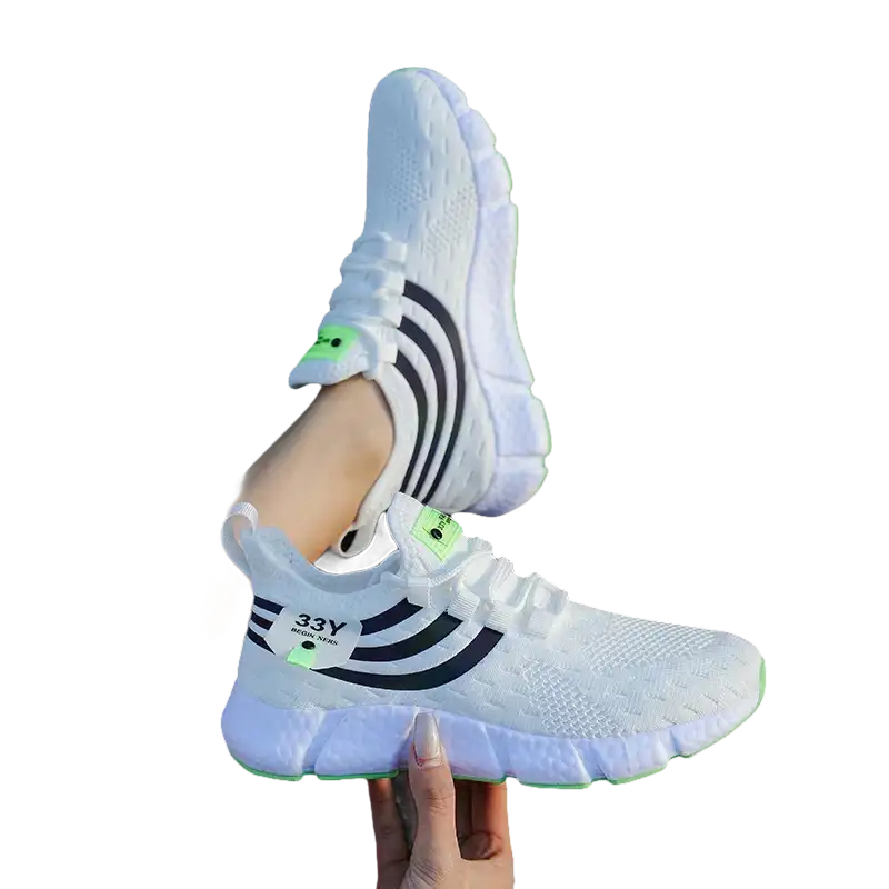 White athletic shoes with black stripes.