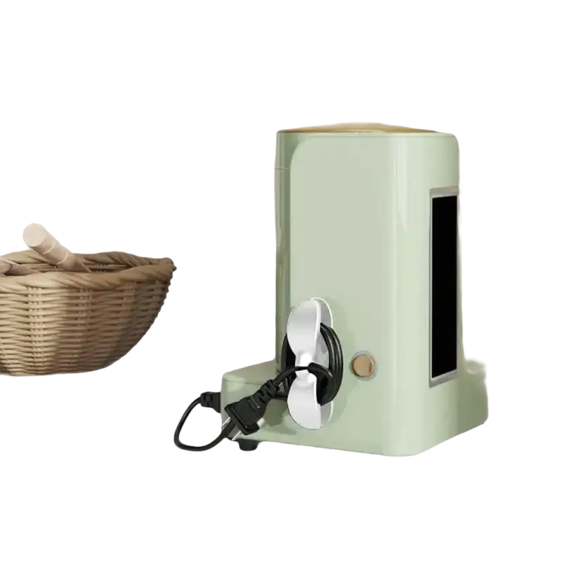 Light green appliance with cord.